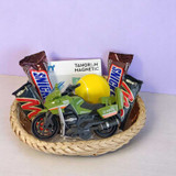 A Kid's Playful Hamper With Snacks For Him