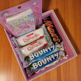 A Gift Hamper Filled with sweet treats & stationery For Her