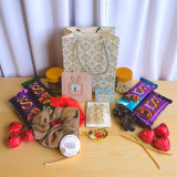 Rakhi Surprise Gift for Sister with Chocolates & Accessories JNK-4367