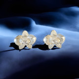 Elegant 3D Silver Floral Stud Earrings with Central Heart-Shaped Crystal