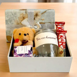 Gift Box with Teddy Keychain, Chocolates, Glass Sipper & Candle JNK-6658