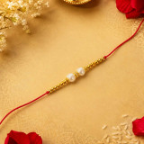Elegant Pearl With Golden Bead Rakhi RK-25