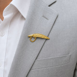 Cultural Majesty: Gold-Tone Khukuri Brooch