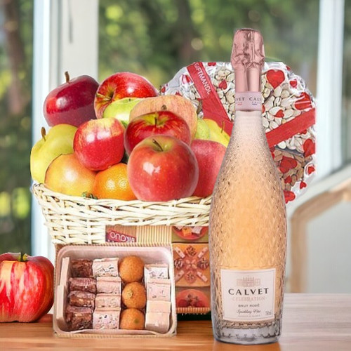 Sparkling Wine, Fruit Basket, Mithai and Dry Nuts Sparkling Wine, Fruit Basket, Mithai and Dry Nuts