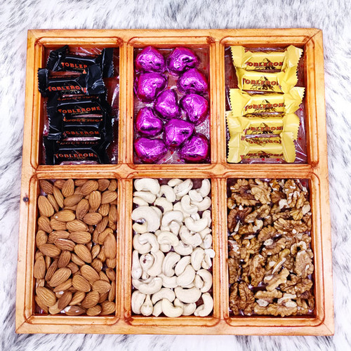Wooden Tray Full of Dry Nuts & Chocolates