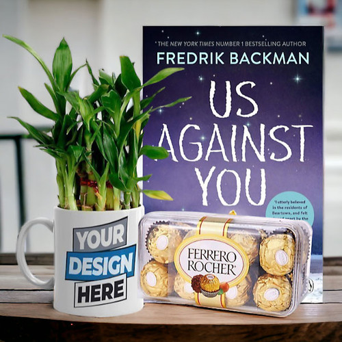 Hamper of 'Us Against You' English Book with Chocolates