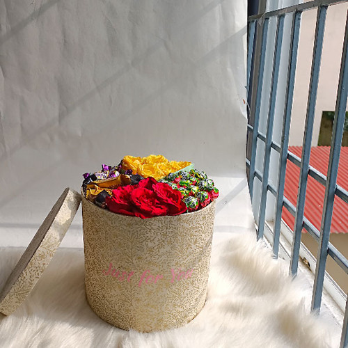 Flowers With Chocolates Arrangement in a Box Hamper