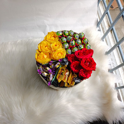 Flowers With Chocolates Arrangement in a Box Hamper