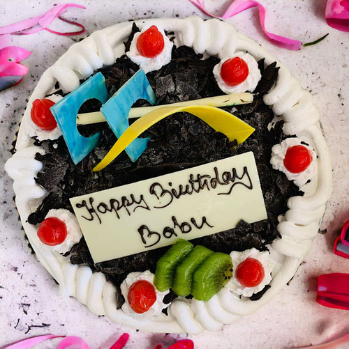 Delightful Black Forest Cake with Chocolate Chips & Rolls on the Top Delightful Black Forest Cake with Chocolate Chips & Rolls on the Top