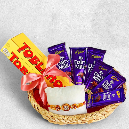 Sweet Rakhi Delight: Rakhi with Chocolates Basket