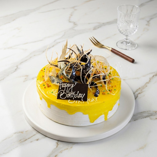 Pineapple Cake with Sophisticated Chocolate Curls By Hotel Himalaya