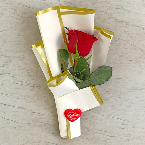 The Beauty of a Single Rose, Exquisitely Wrapped The Beauty of a Single Rose, Exquisitely Wrapped