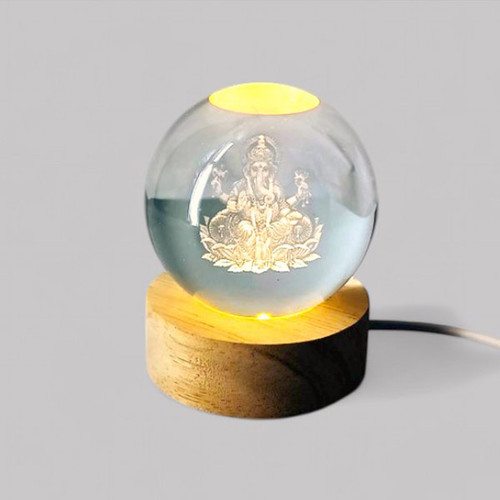 LED Crystal Ball Featuring Lord Ganesh Seated on Lotus – A Symbol of Prosperity