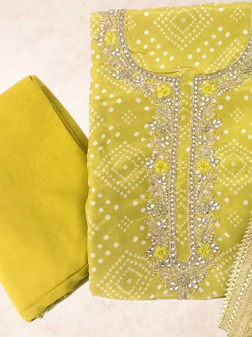 Yellow Muslin Silk Unstitched Kurtha Set with Bandhani Print & Tassel Border Shawl