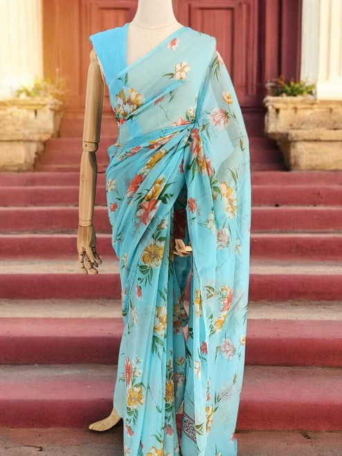 A Stunning Blue Chiffon Saree With Lively Multicolor Floral Prints