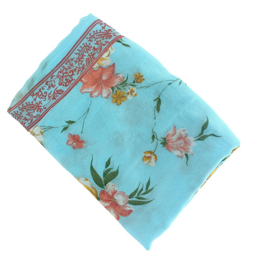 A Stunning Blue Chiffon Saree With Lively Multicolor Floral Prints