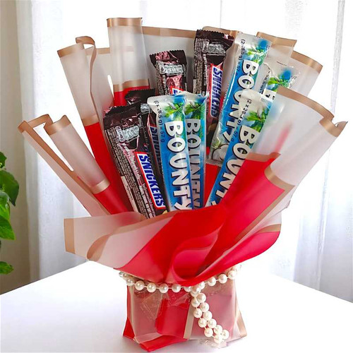 Tropical & Nutty Delight: Bounty & Snickers Bouquet JNK-3900