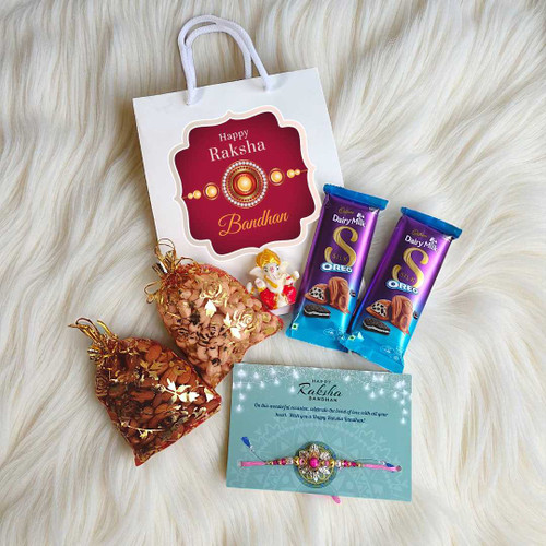 Rakhi Celebration Bag: Chocolates, Dry Nuts & Ganesh Idol JNK-4289