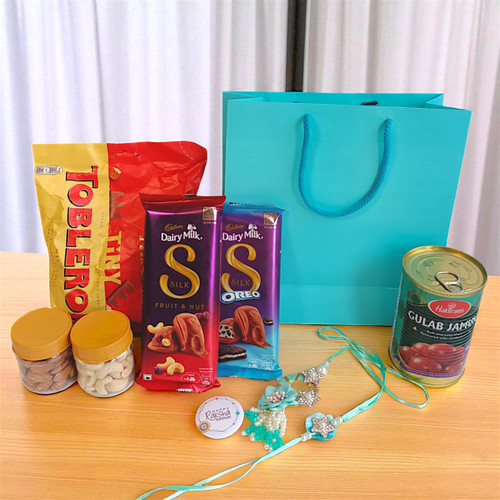 Bhaiya & Bhabhi Rakhi Gift Combo with Sweets