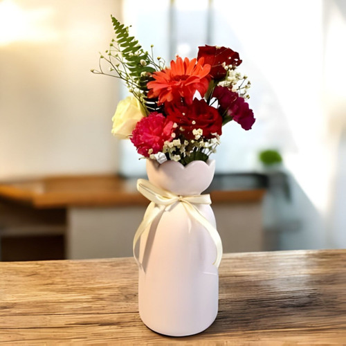 Blooming Joy: Ceramic Pot with Flowers