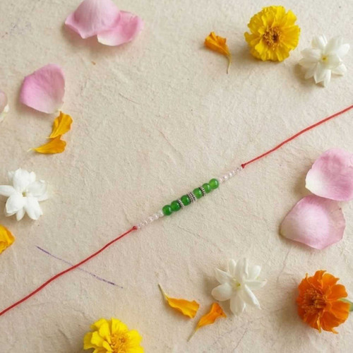 Handmade Green Bead Rakhi with Pearl Accents RK-17