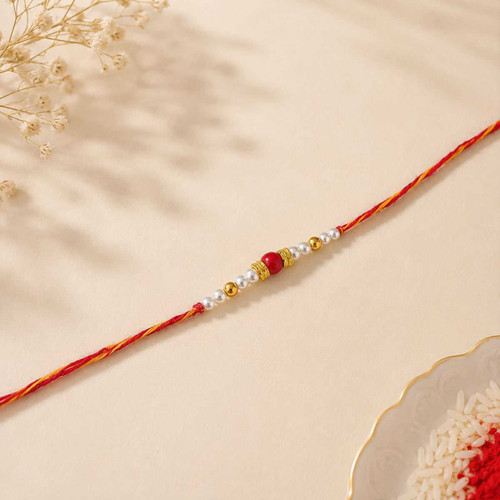 Classic Red Bead Rakhi with Pearl & Golden Accents RK-27