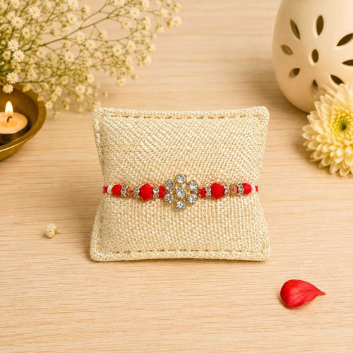 Floral Stone Rakhi with Red Beads & Silver Accents RT-1174