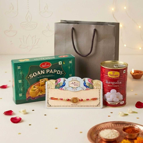 Divine Om Rakhi with Haldiram Sweets Gift Bag SPM-893