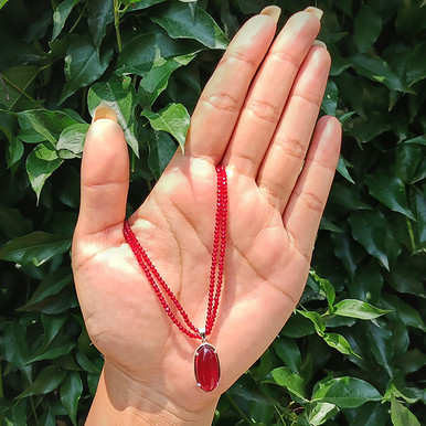 Luxurious Maroon Crystal Pote with Ruby Accents