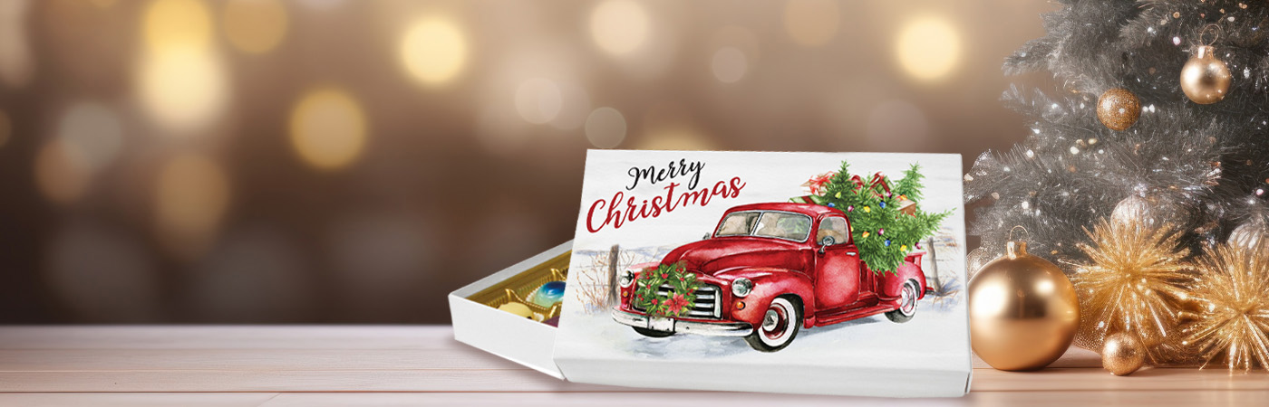 Festive Christmas packaging display with holiday-themed boxes and gift containers