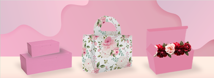 Heart-shaped fabric gift box with a red ribbon and white heart pattern.