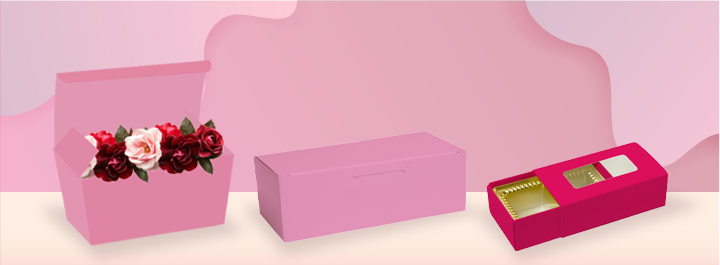 Heart-shaped fabric gift box with a red ribbon and white heart pattern.