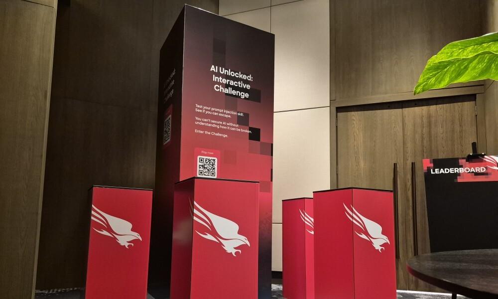 Interactive technology event area with branded demo plinths, leaderboard and engagement displays