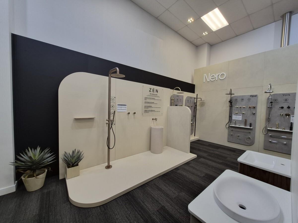 Side view of Nero Tapware experience centre showing integrated displays within existing showroom