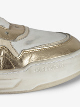 Womens Designer Low Top Gold and White Leather Sneaker with Star and Wing Details