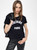 Womens Designer Black Tshirt with Round Neck and Short Sleeves and Voltaire Paris Graphic
