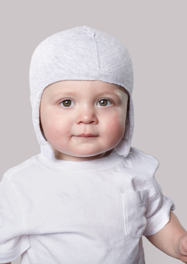 Baby wearing Ionic+™ Mullet Cranial Interface with Velcro Chin Closure