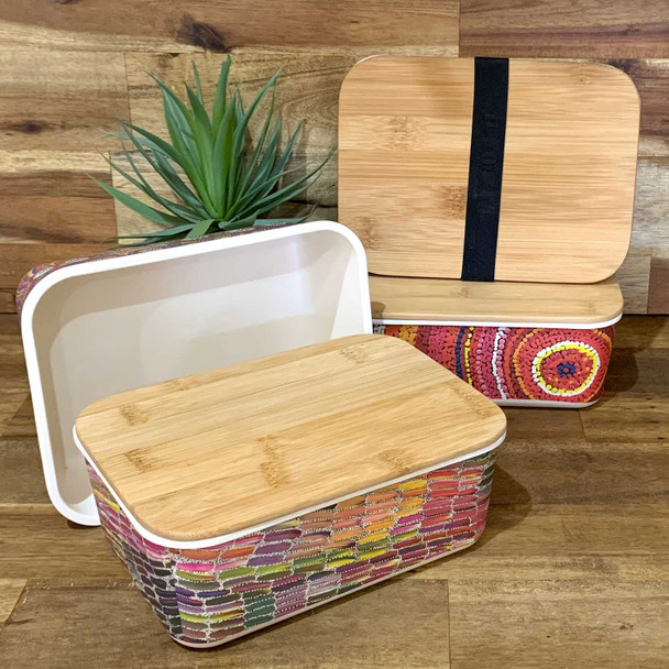 Sturdy bamboo lunch boxes with lid and extra band to keep the lid on tight. With designs by Aboriginal artists from Central Australia