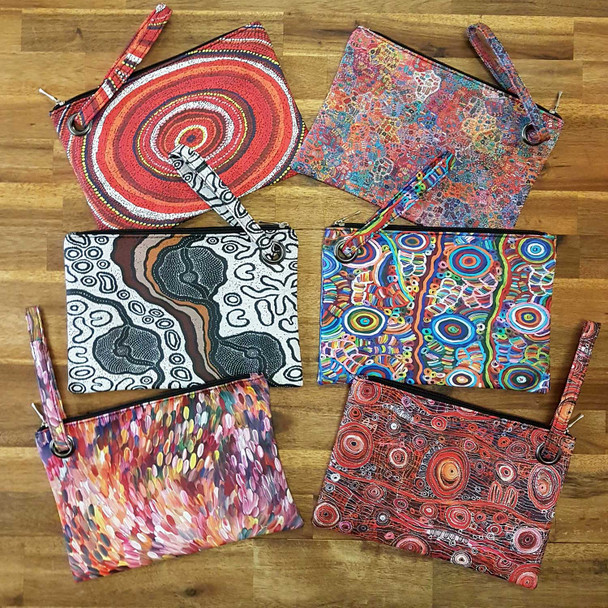 Perfect size clutch featuring the designs of Aboriginal artists from Central Australia