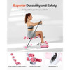 Compact pink glute trainer machine folded flat for easy under-bed or closet storage Compact pink glute trainer machine folded flat for easy under-bed or closet storage
