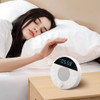 Dual alarm clock feature illuminated, showing separate alarm settings for couples or parents on different schedules