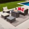 6-piece outdoor patio furniture set with modular rattan sectional sofas, coffee table, ottoman, and propane fire-pit table in backyard setting