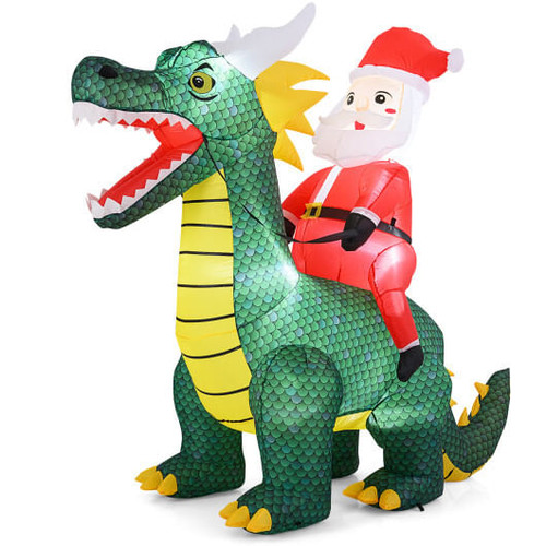6.7FT Inflatable Santa Claus Riding Green Dinosaur with Bright LED Lights glowing in front yard at night , funny outdoor Christmas decoration by Go Big Discounts.