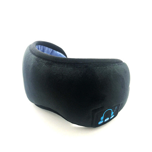 EZ Sleep Bluetooth Eye Mask in soft black fabric, contoured ergonomic design with adjustable straps, placed on a travel pouch, highlighting integrated wireless speakers for sleep, meditation, and travel comfort.