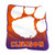 Clemson Tigers 50x60 Raschel Throw Blanket draped over a gray couch, showcasing vibrant orange and purple team logo and ultra-soft plush fabric texture, perfect for home decor, dorms, or game day comfort.