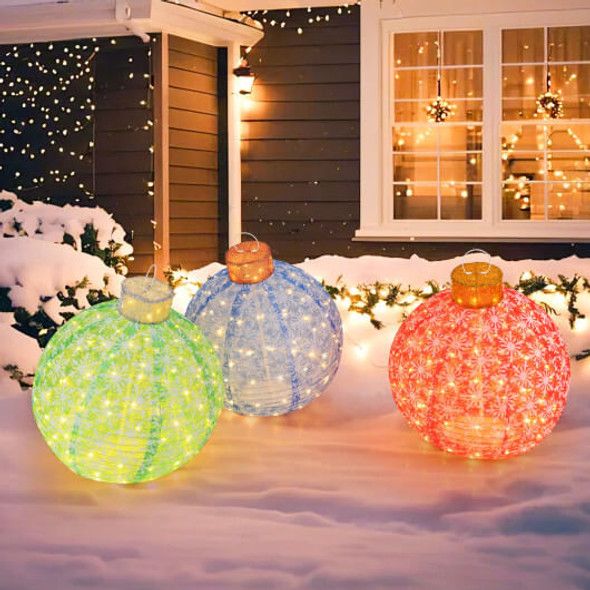 Close-up of pre-lit Christmas ball with swirling warm white LED lights and weather-resistant mesh texture