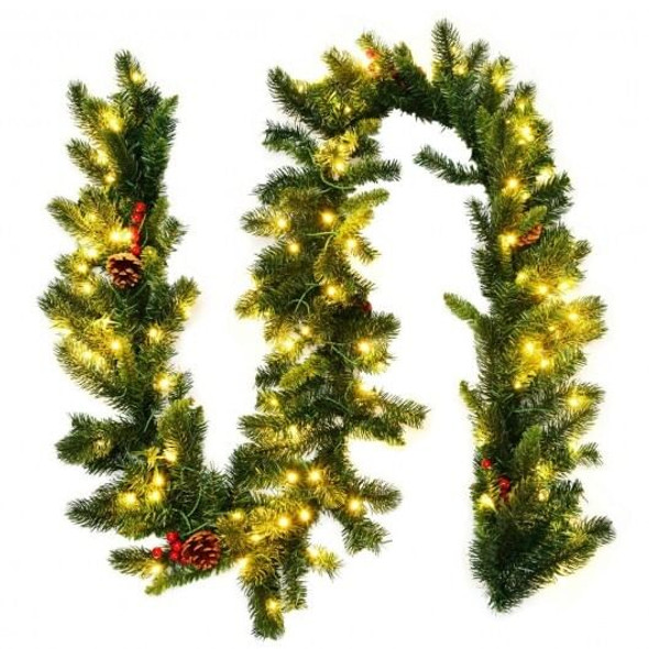 9 foot pre-lit artificial Christmas garland with red berries and warm white LED lights laid out flat showing full greenery and flexible branch design