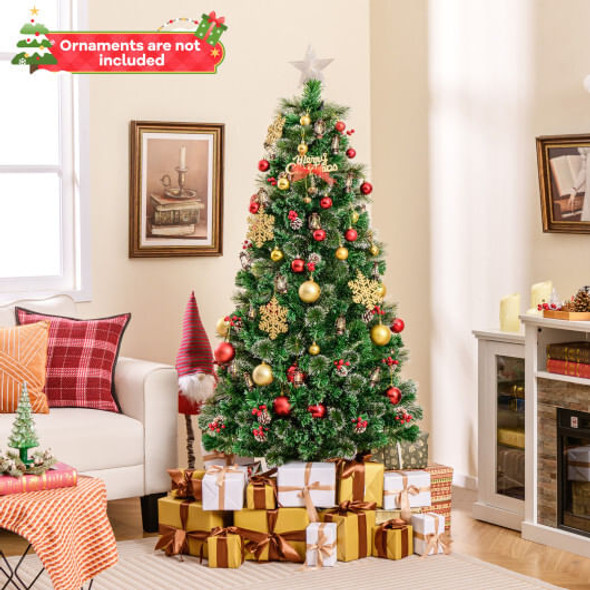 Close-up of vibrant red berries on the branches of a 6 ft artificial Christmas tree, highlighting realistic foliage and festive décor accents.