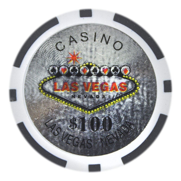 Close-up of Las Vegas 14g clay poker chips stacked neatly on a green felt table
