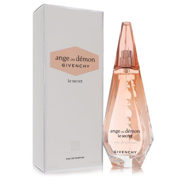 Elegant pink glass bottle of Ange Ou Démon Le Secret by Givenchy displayed on a white marble vanity with soft sunlight, showcasing its sculpted design and luxurious Parisian branding — a romantic fragrance for women.
